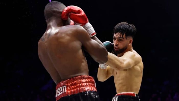 Adam Azim punches Enock Poulsen during the EBU European Super Lightweight Title fight in London, England. Super-lightweight competitors are already vying for Azim's attention after he became the European champion. JAMES CHANCE/GETTY IMAGES.